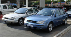 A 1999 Mk2 Mondeo alongside a (pre-2003 facelift) 2002 Mk3 Mondeo