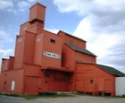 Old wooded cribbed grain elevator and livestock feedmill in 
