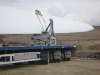 Heavy transport trailer with all-wheel steering remote controlled by a steersman walking at the rear of the trailer (2008).