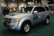 The  was the first hybrid electric vehicle with a  capable of running on  fuel.