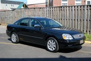 A black 2005 Ford Five Hundred Limited AWD (All-Wheel-Drive)