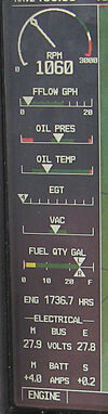 's  tachometer (1,060 RPM) and engine hours (1736