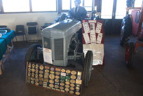 Ferguson TEA20 a regular visitor to vintage machinery events as shown by the 100's of rally plaques