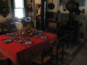 The period decorated kitchen and dining room were part of the first addition to the home.