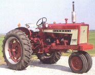 Farmall 504 with dual front wheels, gasoline engine, from used tractor ad