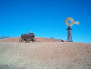 Cart and windmill at the National Ranching Heritage Center in Lubbock, Texas, USA.