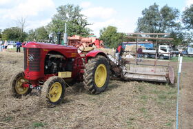 Massey-Harris 744PD with a 6ft cut Massey-Harris Binder