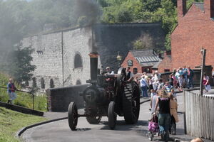 Victory climbing out the 1900's village