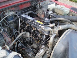 A  2.5-litre 4-cylinder turbodiesel engine is typical of 'first generation' automotive turbodiesels, with mechanical indirect injection, 8 pushrod operated valves and no intercooler. The turbocharger itself is visible in the upper centre of this picture.