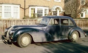 A.C. 2-Litre 1947-1956. The four-door configuration and the wider 6.75 × 16 inch wheels identify this as a later example. The flashing indicators will have been retro-fitted.