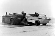 LARC-LX (BARC) amphibious barge unloading a 5-ton LARC-V truck