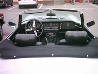 Jaguar E-type c. 1970, with vinyl foldable tonneau installed and snap-secured