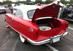 An open trunk lid on a 1955  