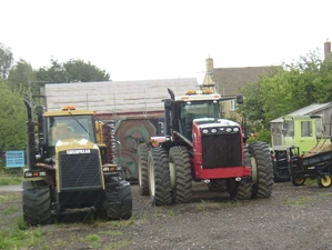 Challenger 85 next to a Versartile 435 in a UK Dealers yard