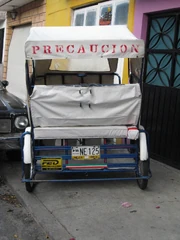 The back view of a "bicitaxi" (as identified by its license plate) from , Mexico