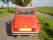 A Citroën 2CV6 Club from the back, the roof rolled open