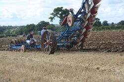 Cable pulled plough closeup