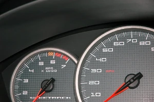 Left figure shows a tachometer that can show up to 7000 