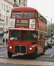 A London  , RML 2473 on route 7 approaching Ladbroke Grove tube station in April 2002.