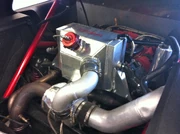 A custom-built air-to-water intercooler, as used in a  car.