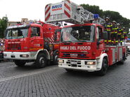 Italian Fire Service vehicles with an Astra crane on the left and a Magirus turntable ladder on the right, Army Parade in Rome, 2 june 2006.