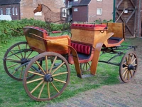 Carriage with elliptic springs