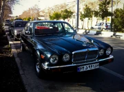 A Jaguar XJ6 alongside  in , Iran.