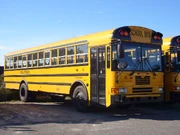An  school bus with an International 3900 chassis.