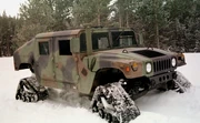 A HMMWV with  snow treads