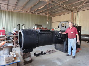 The boiler just back from England, with the new cast chimney base.