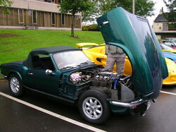 Spitfire with bonnet open, and showing the generous access afforded by the single piece front end