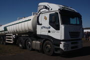 A bulk liquid waste vacuum tanker (note ribbed body strengthened for vacuum pumping of waste from lagoons and storage tanks) used to transfere waste to treatment plants