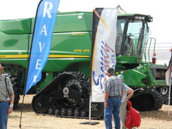 JD 9770 STS combine w tracks - 2011