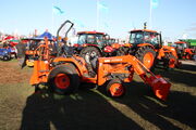 Kubota tractor fitted with loader and Backhoe attachment at LAMMA 2012 -IMG 3833