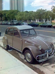 Citroën 2CV with front "Suicide Doors", post-1960 bonnet, and oversized factory protective bumpers in Buenos Aires, Argentina