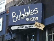 Outside of the former Bubbles Mansion sports bar.