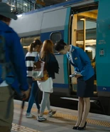 Min-ji greeting passengers