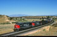 Two examples of SP Dash 9 units seen with their predecessor: an EMD SD45T-2.