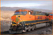 BNSF #999 "Triple Nine" with a rare Heritage 3-painted C40-8W coupled behind (as seen in a brief glimpse on the far right of the photo).