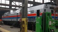 Amtrak P42DC #130 rests inside the Beech Grove Shops after being painted and refurbished. It is to become the replacement for Amtrak #66, which wrecked after hitting a truck. #66 is to be slowly scrapped, and according to Amtrak shop employees, #66 has already been cannibalized for parts.