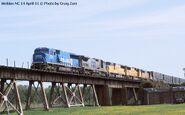 A patched former Conrail (CSX) SD60I leading a CSX train just a full year and a half prior from the Conrail split of 1999.