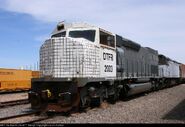 DTFR #2003, the "odd-ball" crash test SD45T-2 used for safety experiments at EMD's Pueblo, Colorado testing facility (the F40PH in the background is also used for crash test experiments).