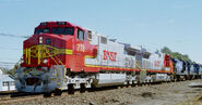 Two brand-new BNSF 700-series Dash 9's leading a Conrail train near Erie, PA.