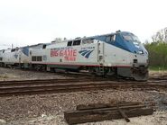 AMTK #189 wearing a special banner celebrating or commemorating their special 'football rival' Heartland Flyer train.