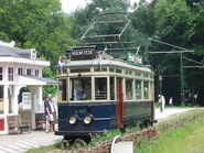 Motorwagen NZH A327 in actie in het Openluchtmuseum