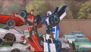 Sideswipe talking to Strongarm