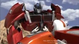 Optimus explains to Ratchet