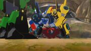 Robots in Disguise Episode 5 Bumblebee Instructing His Team