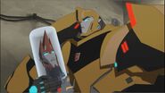 Bumblebee holding Sideswipe's head