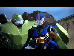 Arcee holding an injured Raf